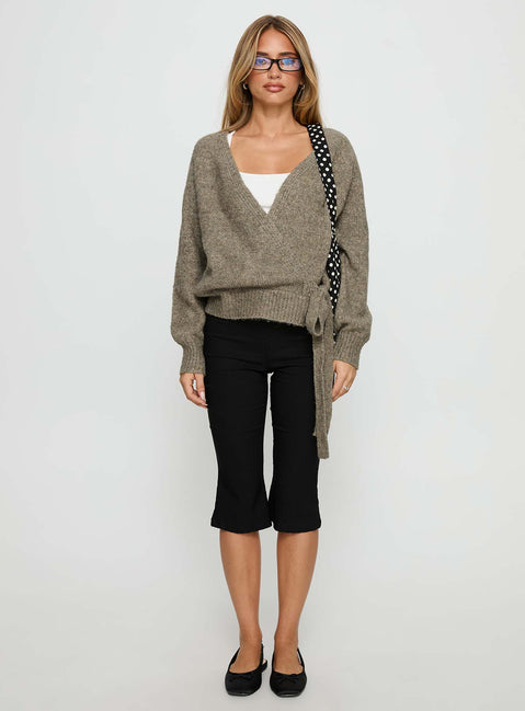side view of model wearing Princess Polly Daelan Wrap Knit Cardigan Brown regular 