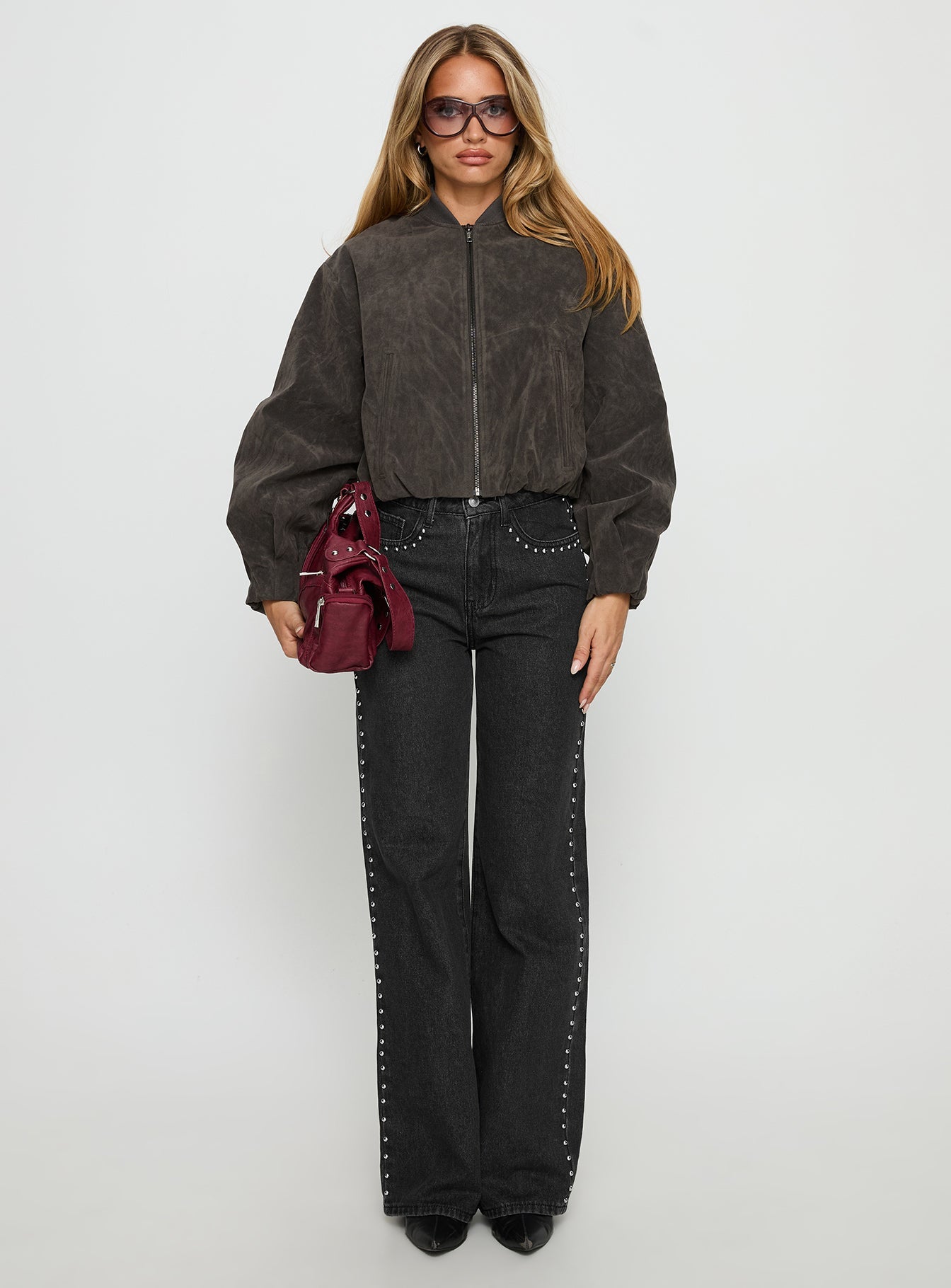 front view of model wearing Princess Polly Saving Up Stud Detail Jeans Jet Black High Rise Jeans 
