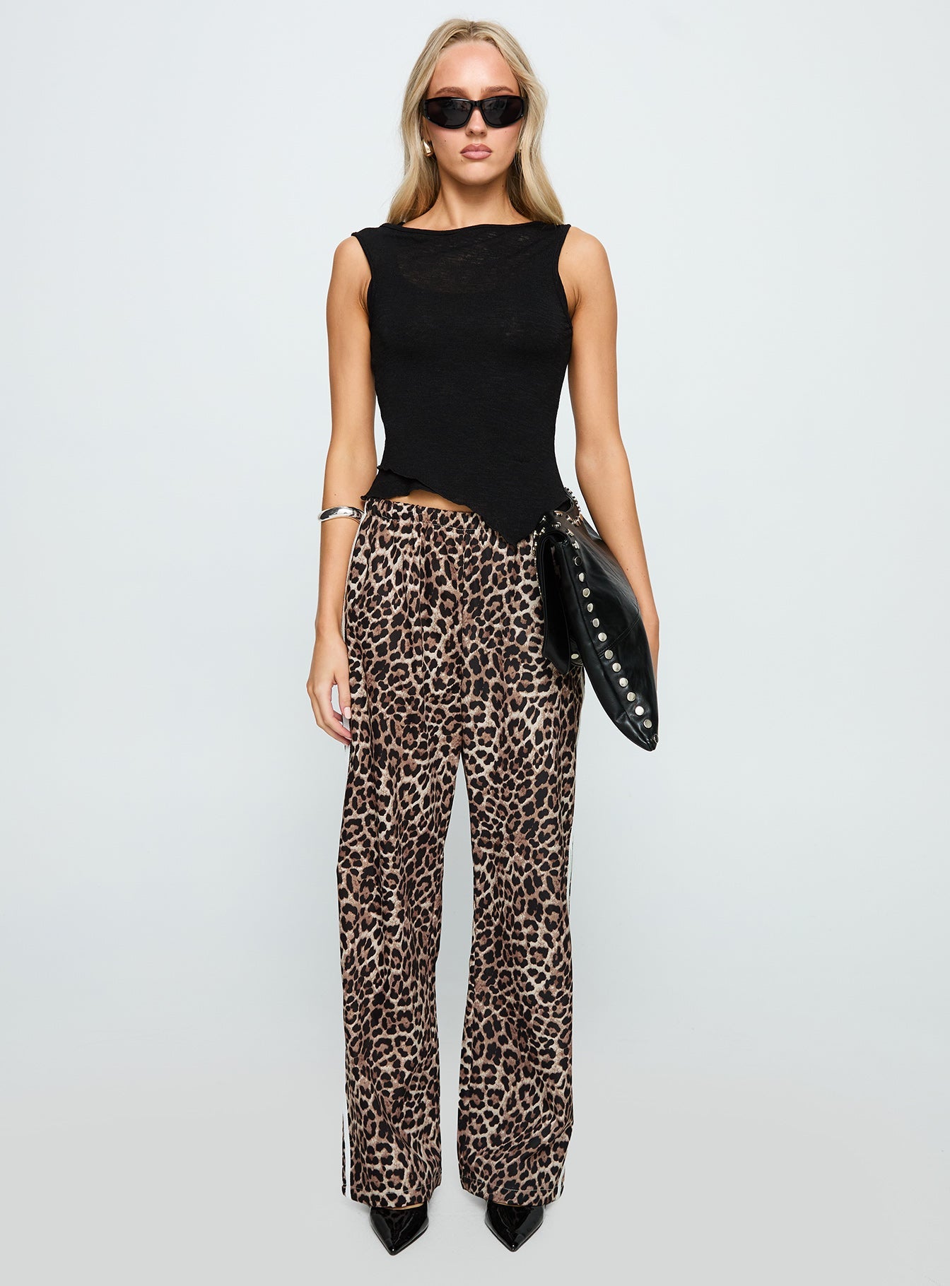 front view of model wearing Princess Polly Buzzer Track Pants Leopard High Waisted Pants 