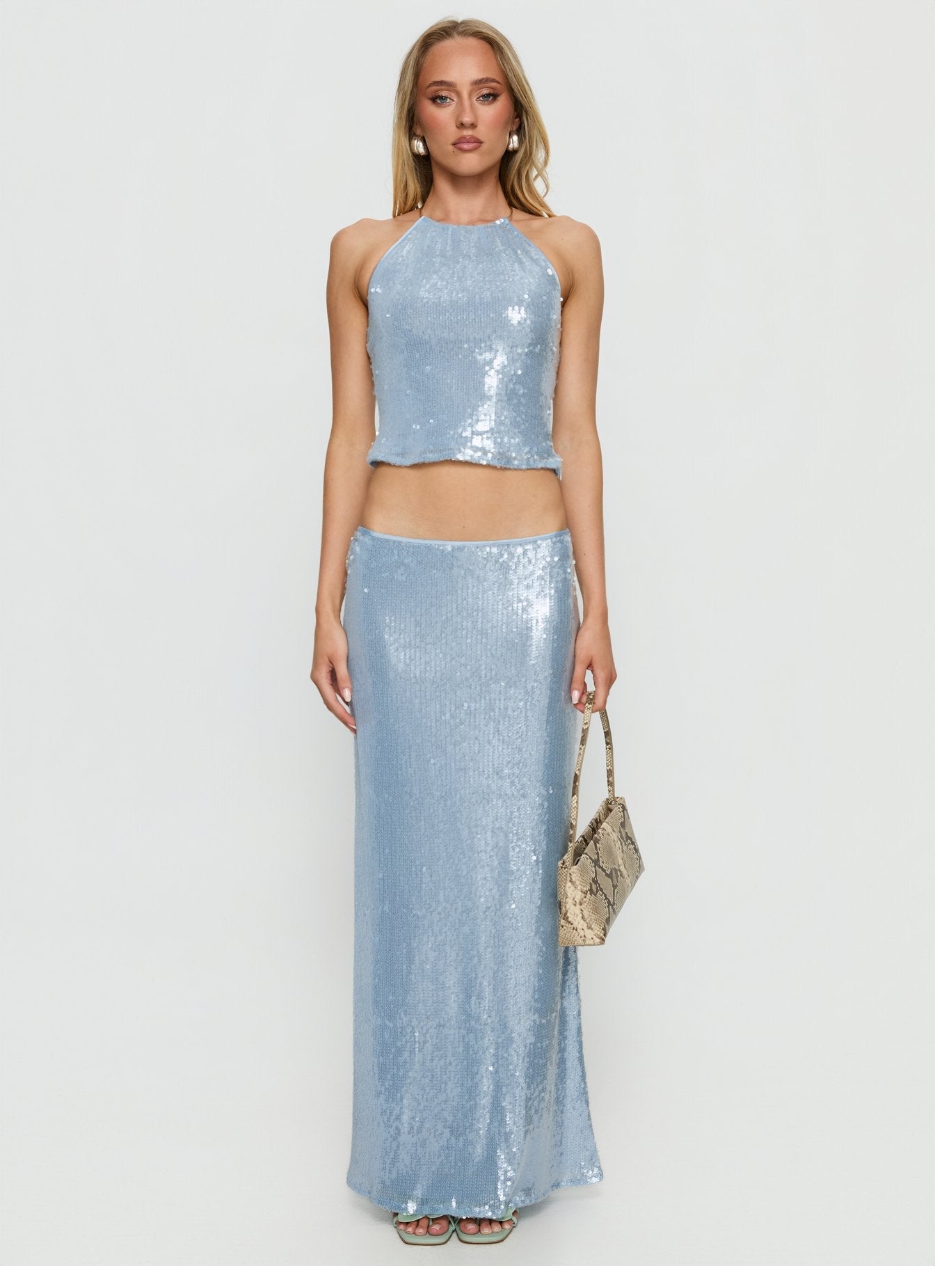   side view of model wearing Princess Polly Emalia Sheer Sequin Maxi Skirt Blue 