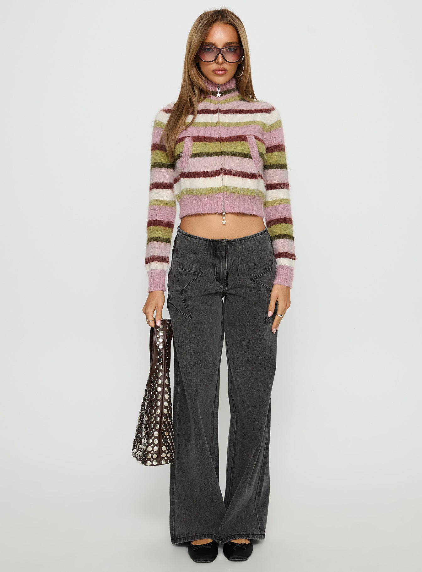 side view of model wearing Princess Polly Keeva Zip Through Knit Jumper Pink / Green Stripe 