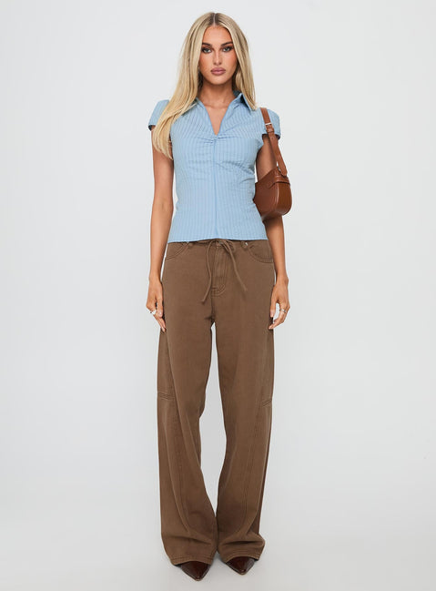 front view of model wearing Princess Polly Bruiser Mid Rise Wide Leg Jeans Brown Mid Rise 