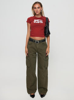 side view of model wearing Princess Polly Ahstin Cargo Jeans Green Low Rise Jeans 