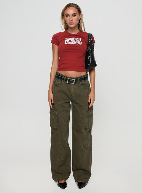 side view of model wearing Princess Polly Ahstin Cargo Jeans Green Low Rise Jeans 