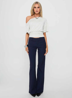 front view of model wearing Princess Polly Kinkirk Flared Pants Navy Pinstripe Low Rise Pants 