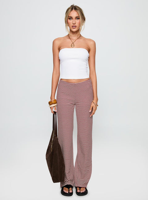 side view of model wearing Princess Polly Next To Me Lounge Pant Red / White Stripe Low Rise Pants 