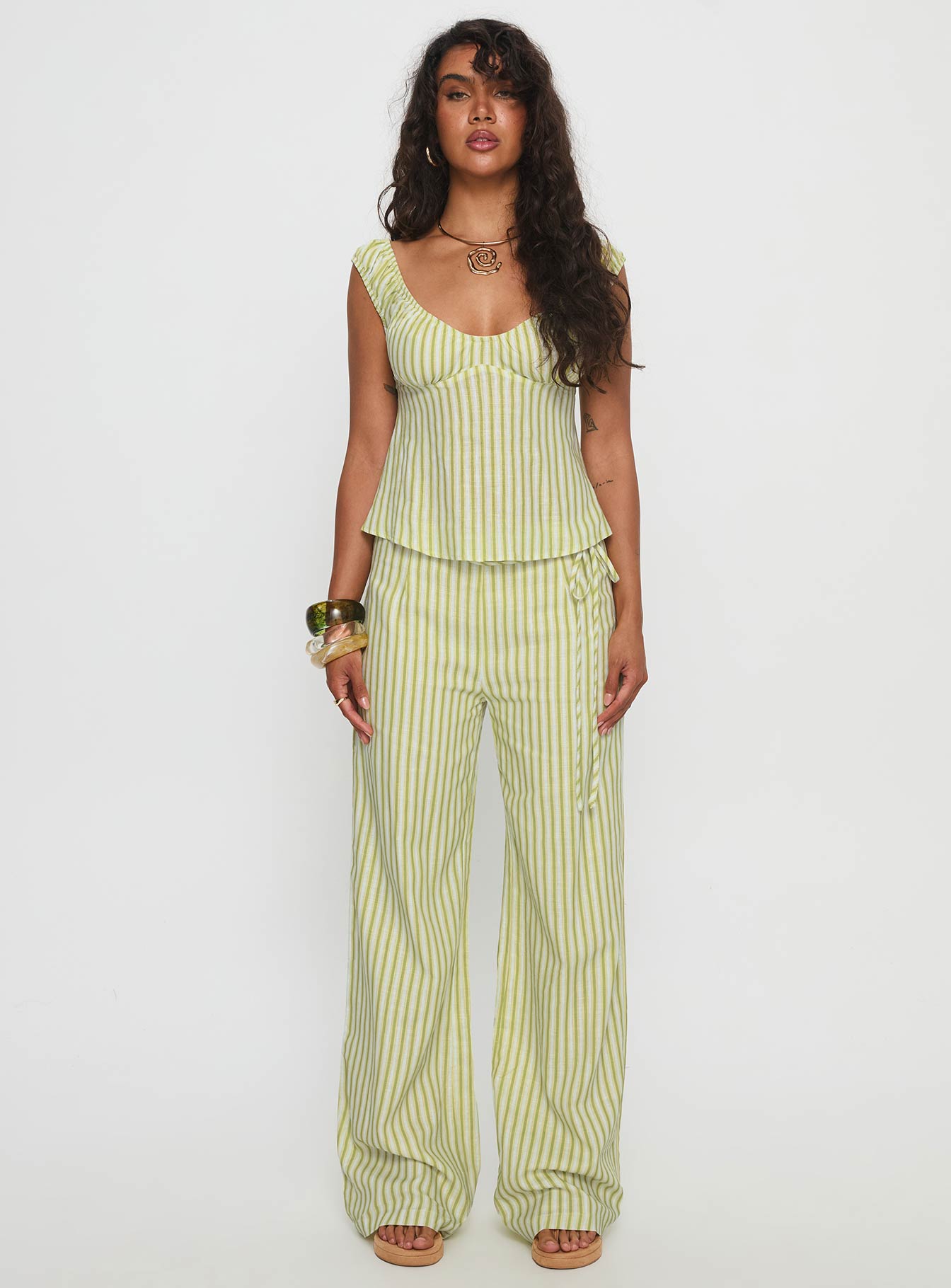 front view of model wearing Princess Polly With Pleasure Tie Side Pant Green / Blue Stripe Mid Rise Pants 