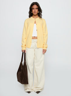 side view of model wearing Princess Polly Arica Button Up Knit Cardigan Lemon Long 
