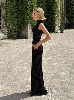   side view of model wearing Princess Polly Ford Maxi Skirt Onyx Polka Maxi 