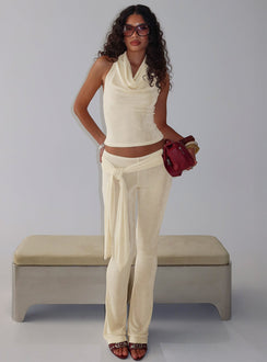 front view of model wearing Princess Polly Butterfly Tie Detail Pants Lemontini Mid Rise Pants 