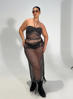   side view of model wearing Princess Polly Alnet Maxi Skirt Black Curve Maxi 