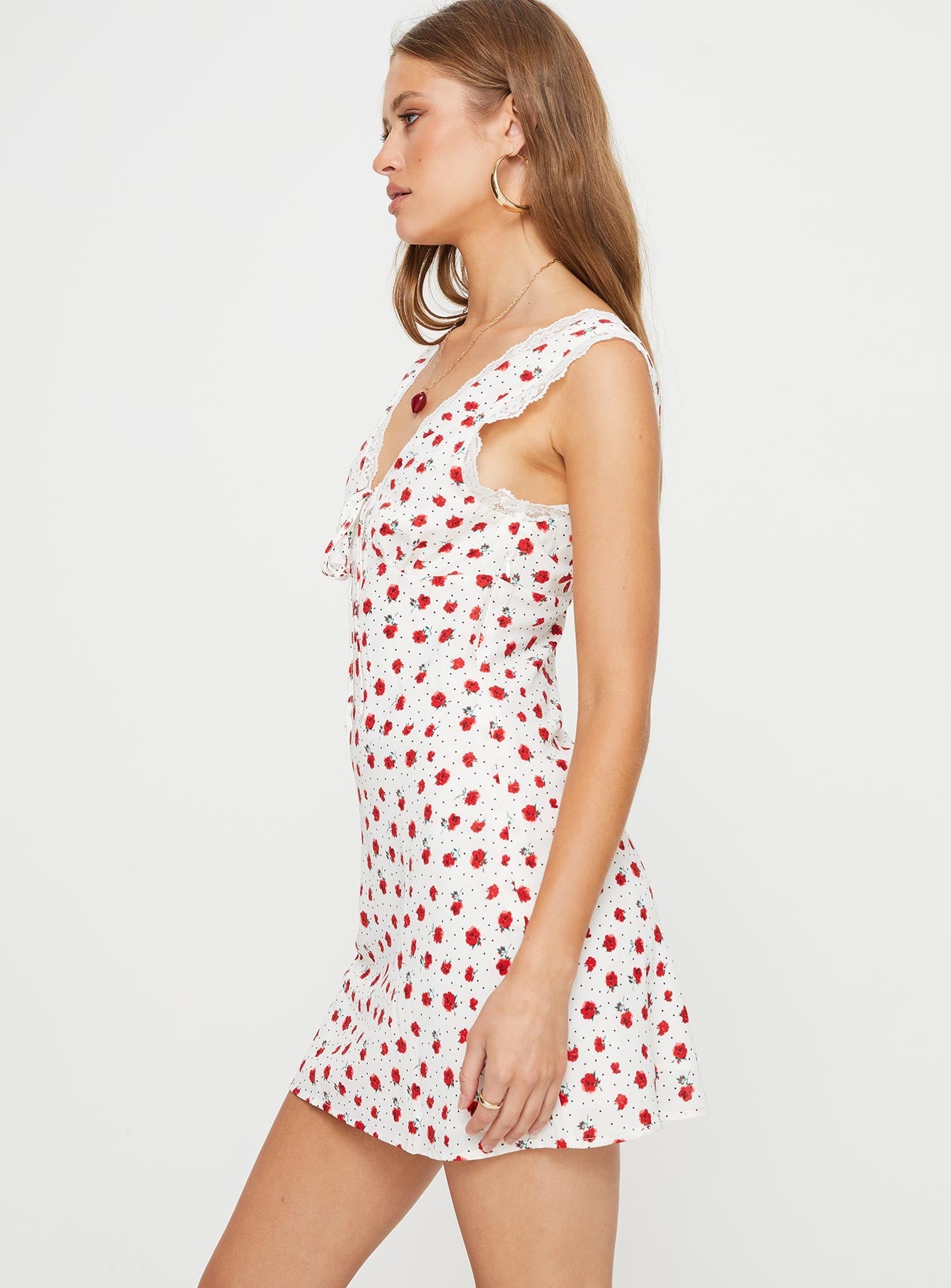 Floral mini dress Fixed wide shoulder straps, tie detail at bust, lace trim, invisible zip fastening at side Non-stretch material, fully lined