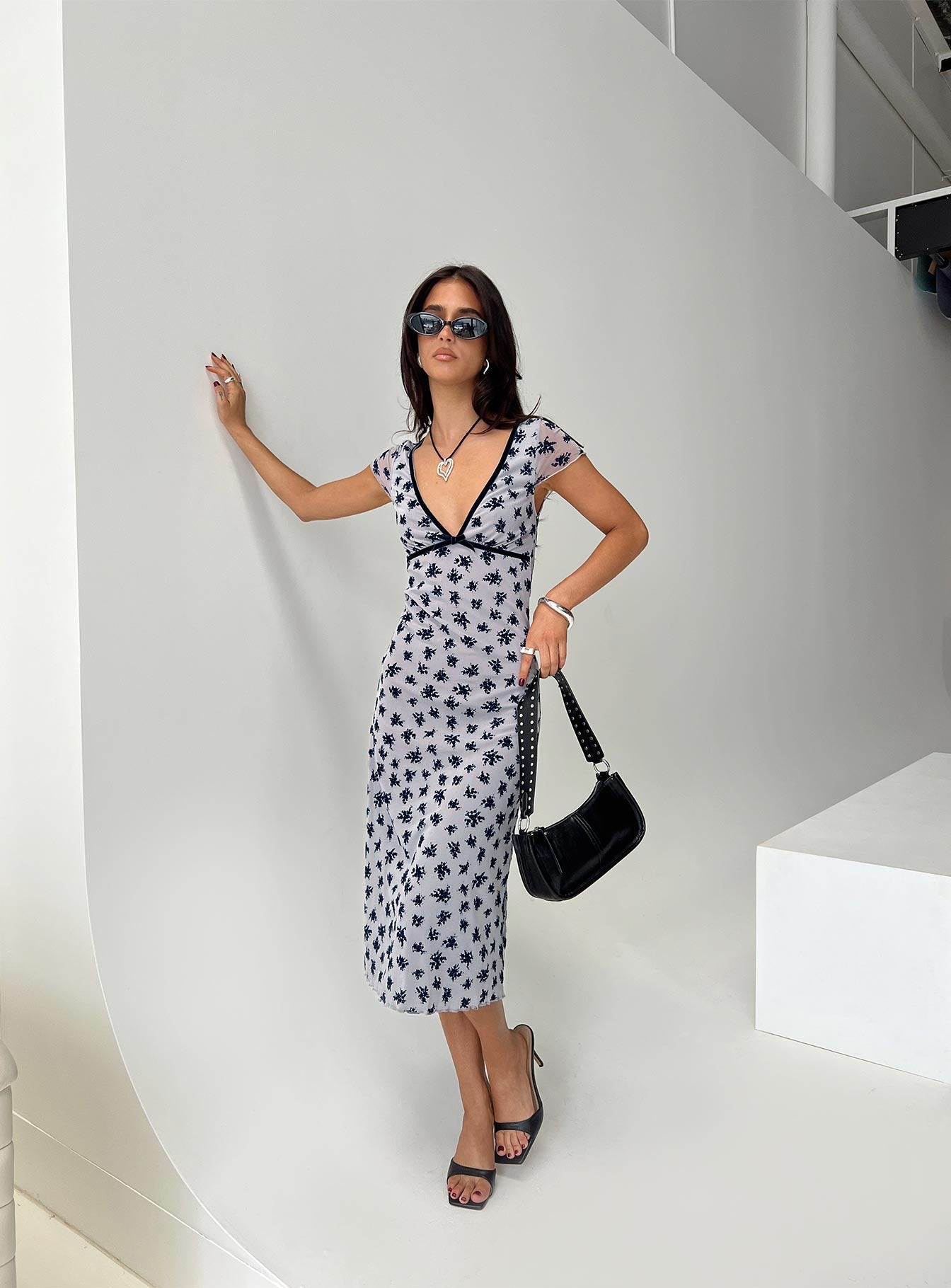 back view of model wearing Princess Polly Vilinia Midi Dress Floral Cluster Grey Plunger 