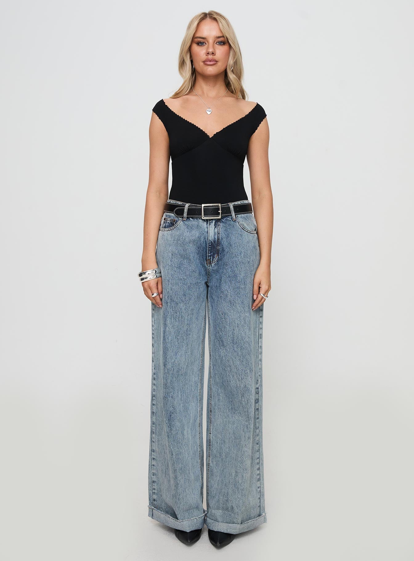 front view of model wearing Princess Polly Faure Bodysuit Black Sleeveless V-Neck 