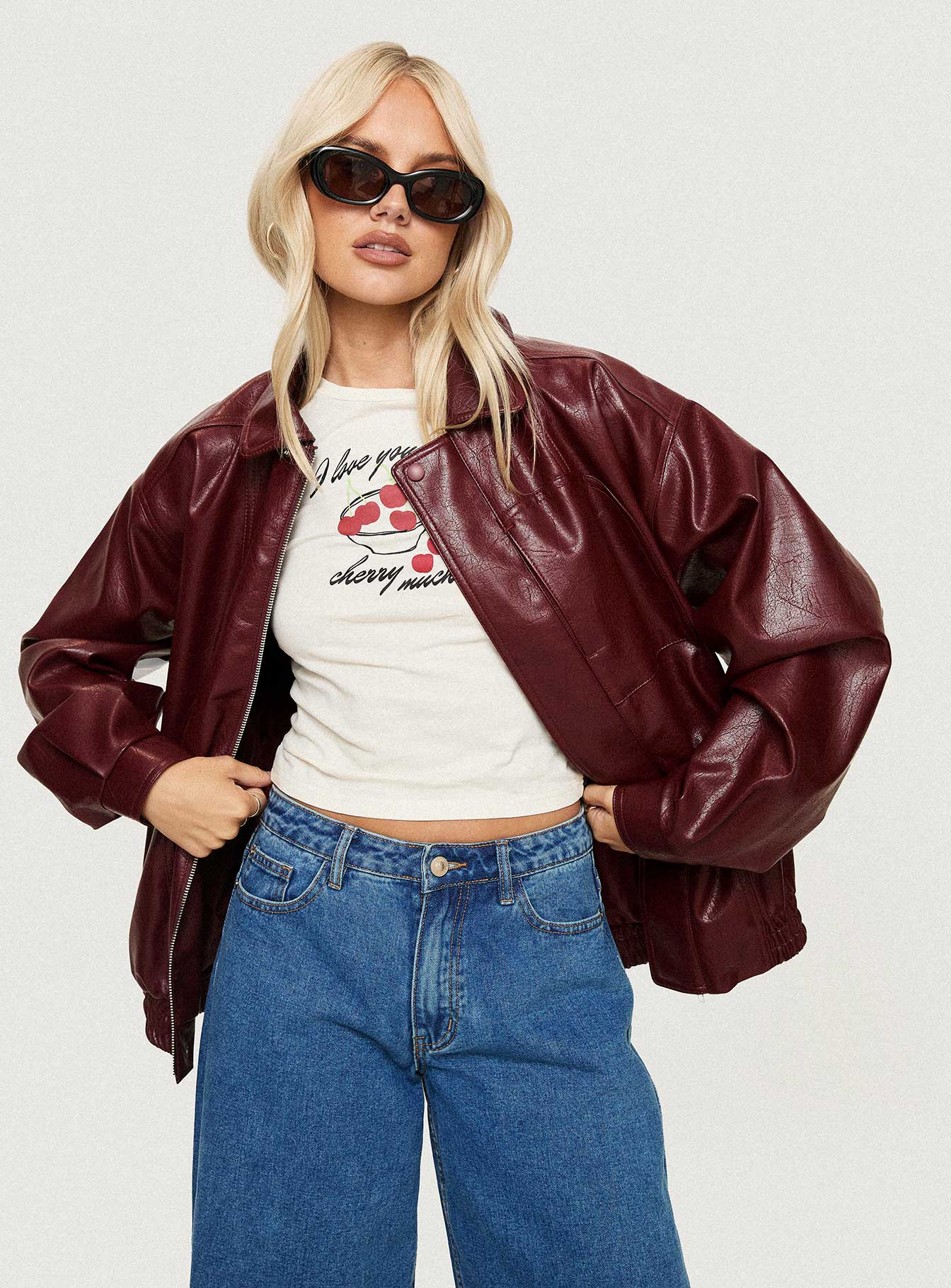 Burgundy Faux Leather jacket Oversized fit, zip fastening at front, classic collar, twin hip pockets, elasticated waistband