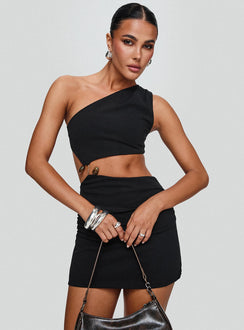 front view of model wearing Princess Polly Hardward Mini Dress Black Tall Asymmetric Neckline 