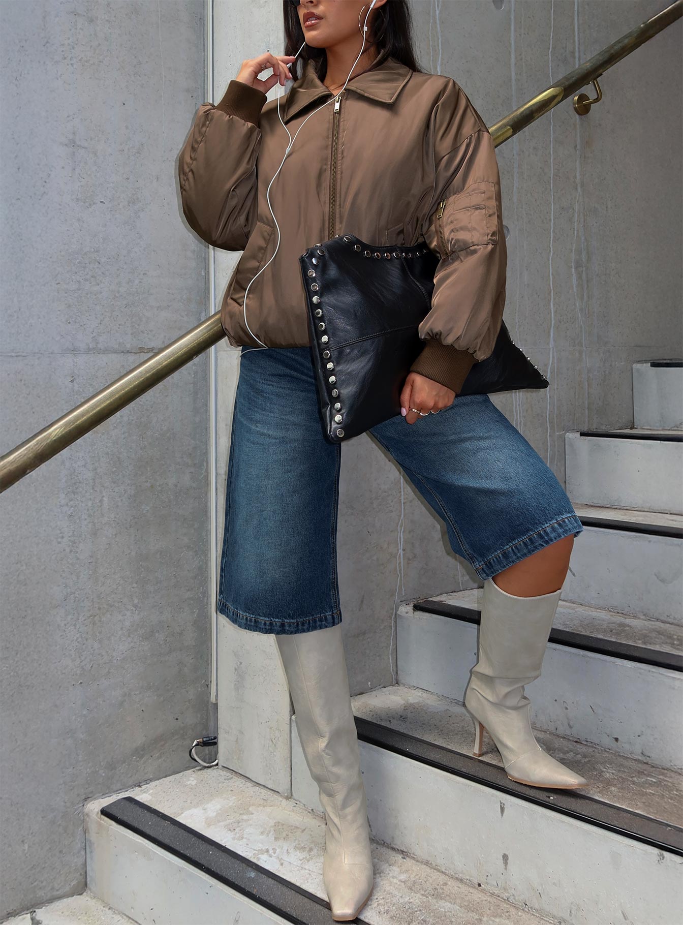 front view of model wearing Princess Polly Ollison Longline Denim Shorts Blue High Waisted Shorts 