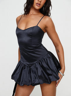 back view of model wearing Princess Polly Dollhouse Mini Dress Navy V-Neck 