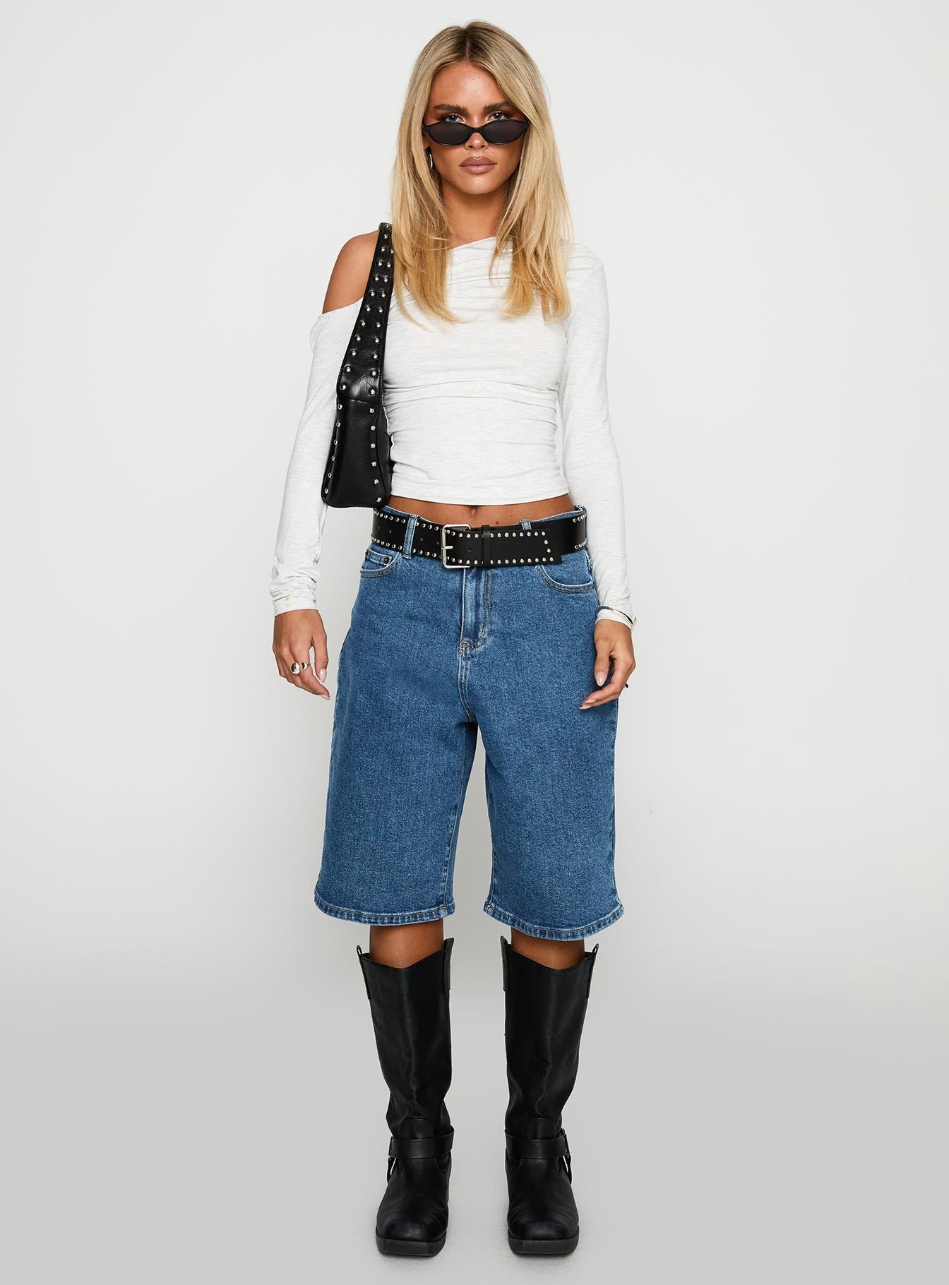 front view of model wearing Princess Polly Retro Dream Mid Rise Longline Denim Shorts Mid Wash Low Rise Shorts 