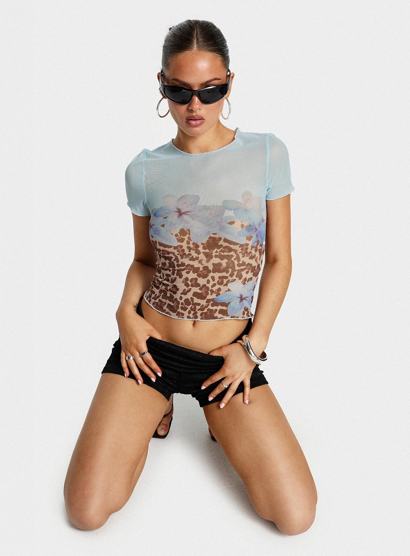 front view of model wearing Princess Polly Pop Quiz Mesh Top Blue / Leopard Short Sleeves Crew Neck 
