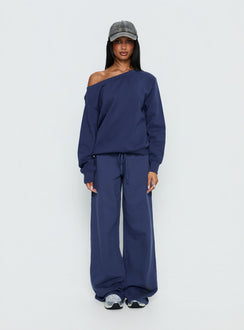 side view of model wearing Princess Polly Wellness Off the Shoulder Jumper Navy 
