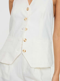 White Matching linen set Halter neck top, fixed halter strap, button fastening at front, twin hip pockets High rise pants, belt looped waist, zip and button fastening, elasticated waistband at back, twin hip pockets, straight leg