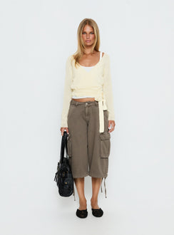 front view of model wearing Princess Polly Tonee Sheer Wrap Knit Cardigan Butter Cream cropped 