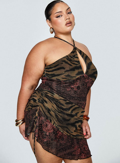 side view of model wearing Princess Polly Syrefena Halter Mini Dress Multi Curve Plunger 