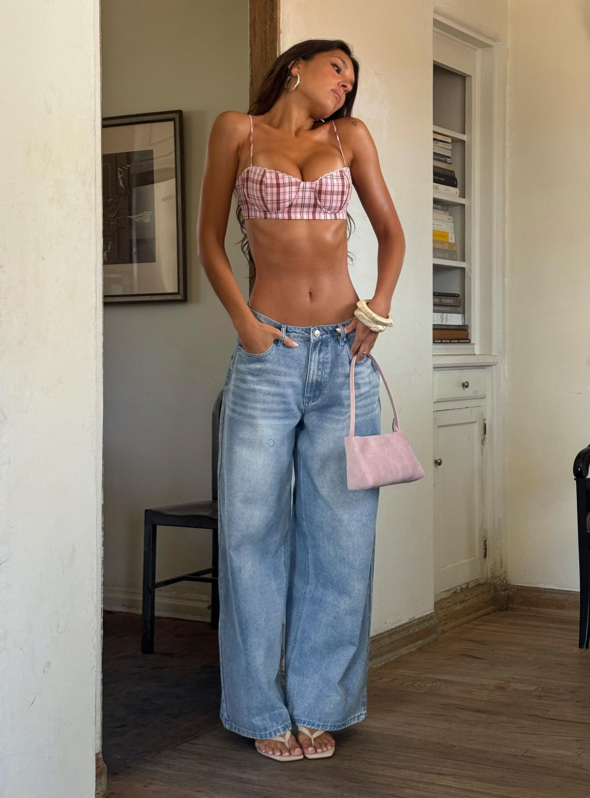 Showcasing Naylor Mid Rise Wide Leg Jeans Light Wash Denim Light Blue Wash Petite in womens-jeans with mid-rise front view of model wearing