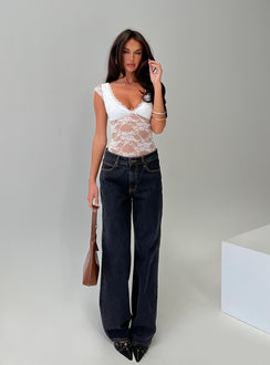 side view of model wearing Princess Polly Tantalize Bodysuit White Short Sleeve 