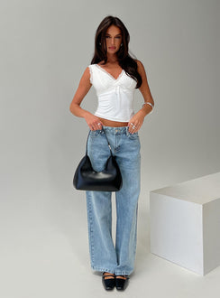 front view of model wearing Princess Polly Zyair Top White Sleeveless Plunger 