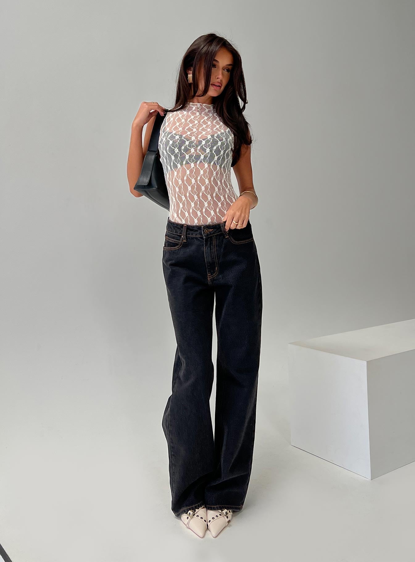 side view of model wearing Princess Polly Liedman Bodysuit Cream Sleeveless 