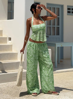 front view of model wearing Princess Polly Finesse Halter Top Green Floral Sleeveless Square Neck 