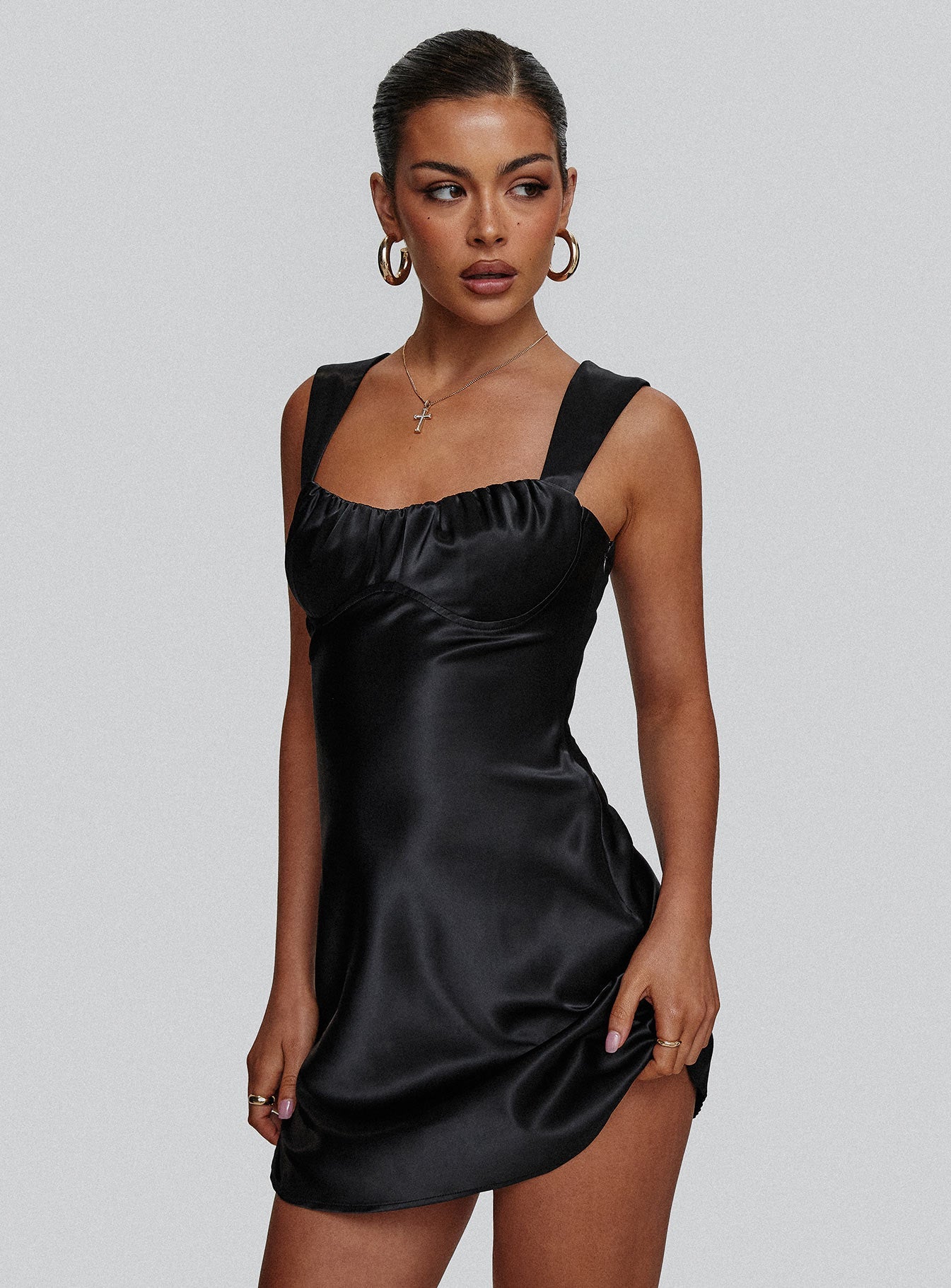 side view of model wearing Princess Polly Tremont Mini Dress Black Sweetheart Neckline 