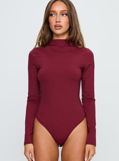 front view of model wearing Princess Polly Augustness Long Sleeve Bodysuit Burgundy Long Sleeve Tops Bodysuit 