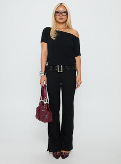 side view of model wearing Princess Polly Kortnee Eyelet Detail Flare Leg Pants Black Low Rise Pants 