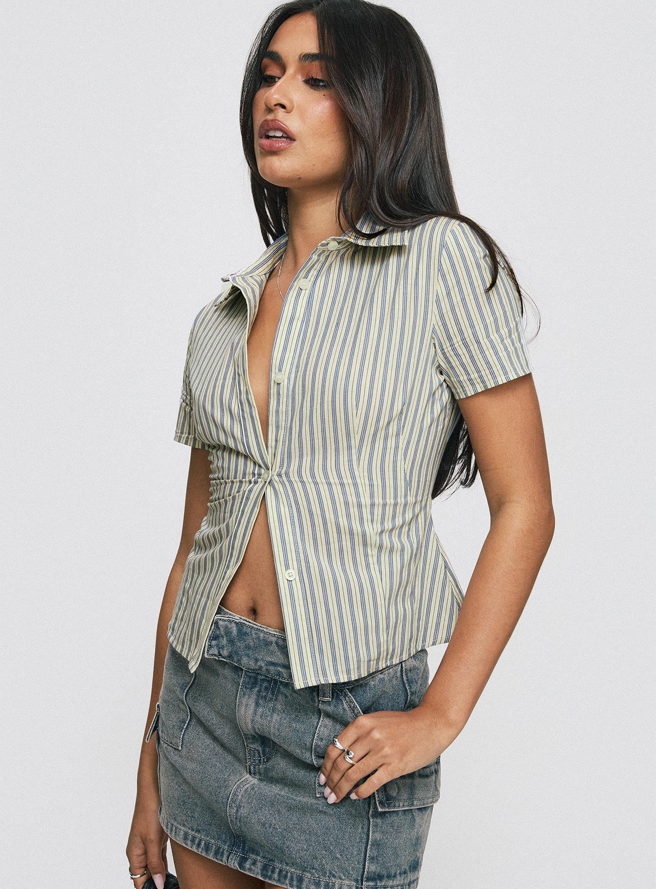 side view of model wearing Princess Polly Peppy Shirt Stripe Short Sleeves V-Neck 