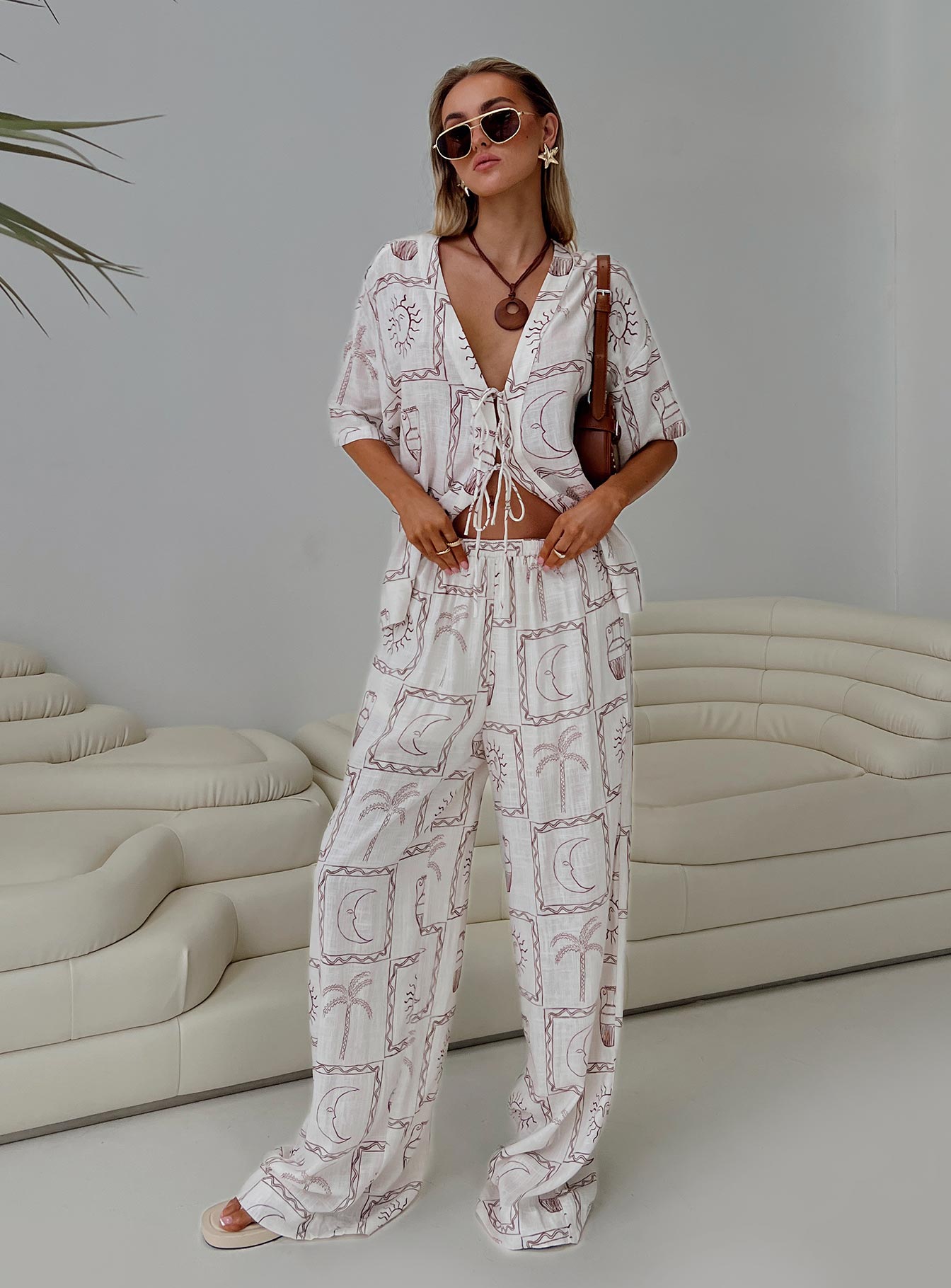 front view of model wearing Princess Polly Sun Dream Pants Cream / Multi High Waisted Pants 