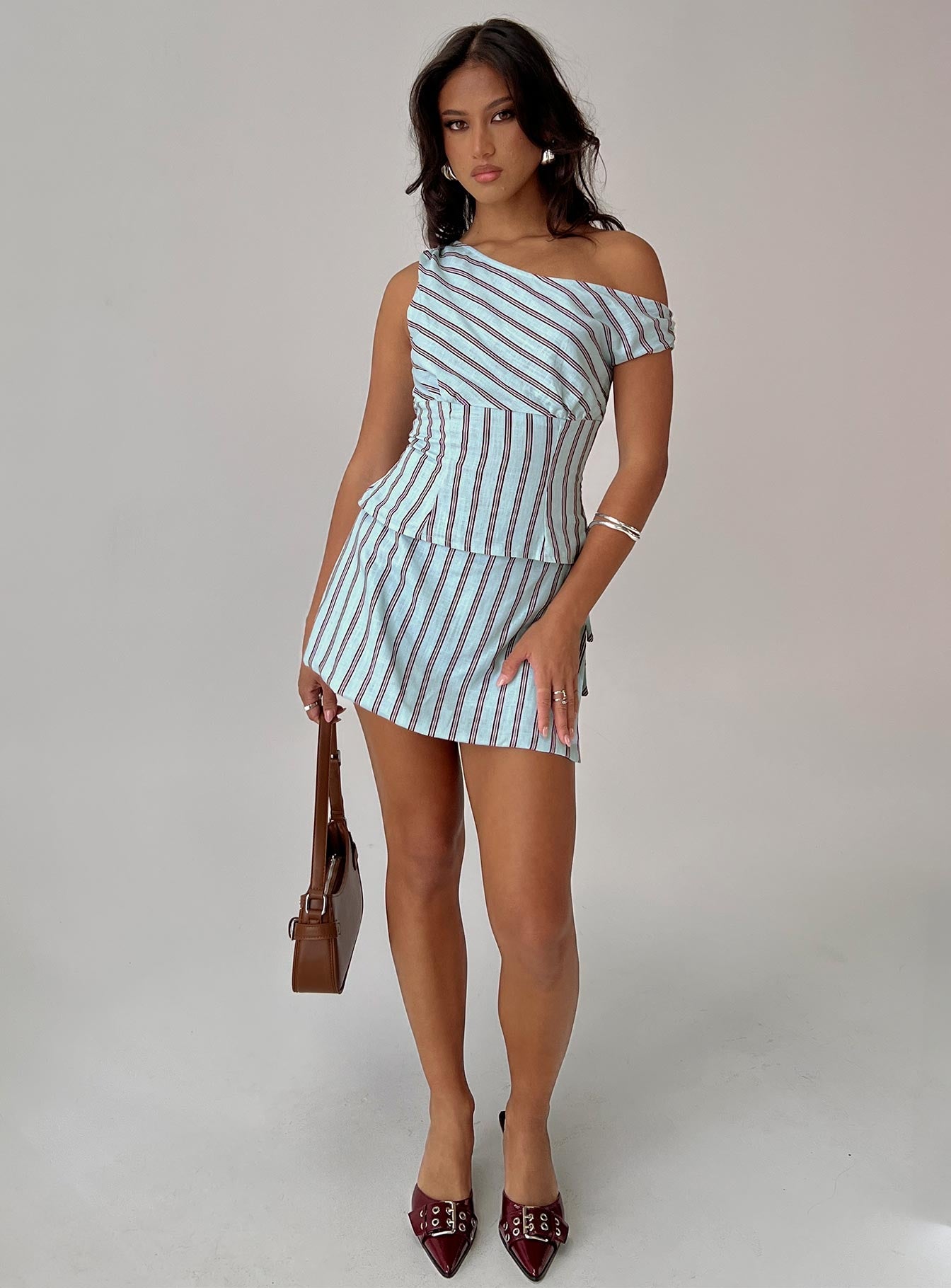 front view of model wearing Princess Polly Del Rio Off The Shoulder Top Blue / Maroon Short Sleeves Asymmetric Neckline 