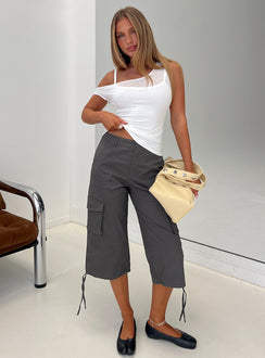 Featuring the Alfonza Utility Capri in Slate womens-regular-pants with mid-rise cargo styling front view of model wearing Princess Polly