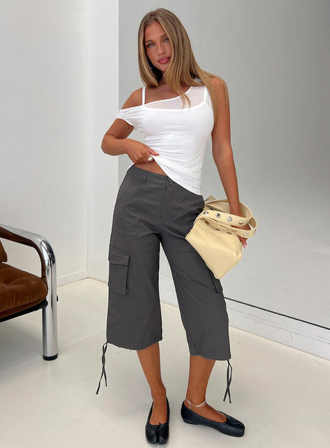Featuring the Alfonza Utility Capri in Slate womens-regular-pants with mid-rise cargo styling front view of model wearing Princess Polly