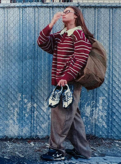 side view of model wearing Princess Polly Rising Sun Jersey Crimson Longline Jumpers 