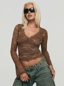 front view of model wearing Princess Polly Pitter Long Sleeve Top Brown Full Sleeves V-Neck 
