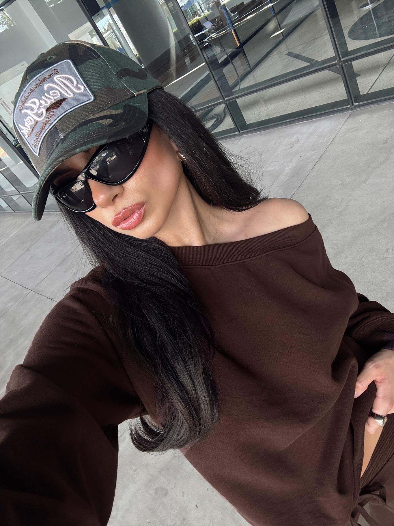 side view of model wearing Princess Polly Wellness Off The Shoulder Jumper Brown Cropped Jumpers 