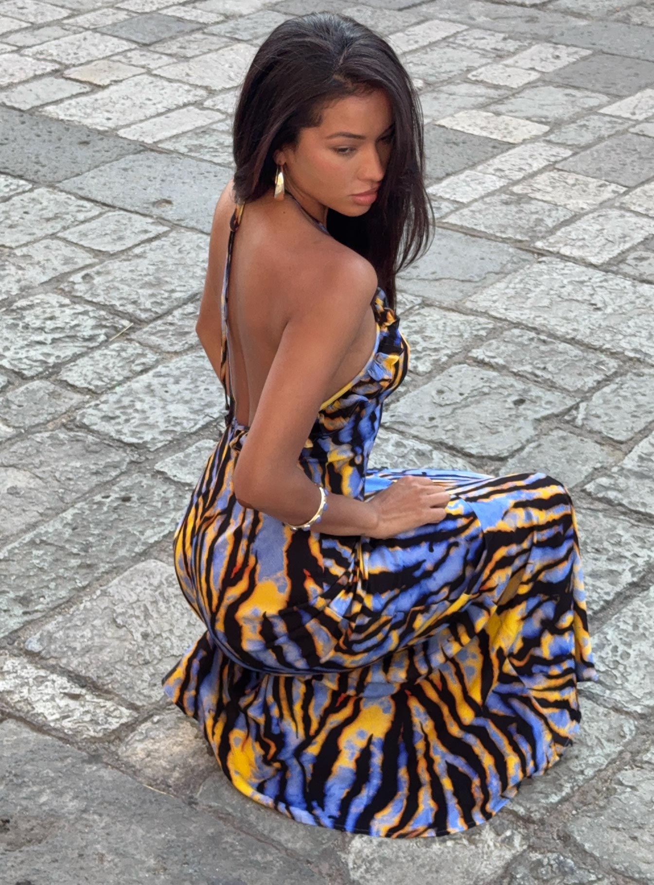 side view of model wearing Princess Polly Virginia Beach Backless Maxi Dress Blue Zebra High Neck 