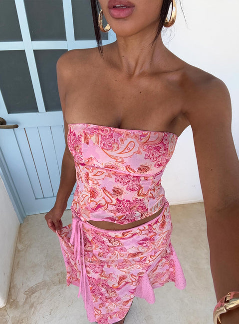   side view of model wearing Princess Polly Tipsy Midi Skirt Pink Paisley Midi Skirts 
