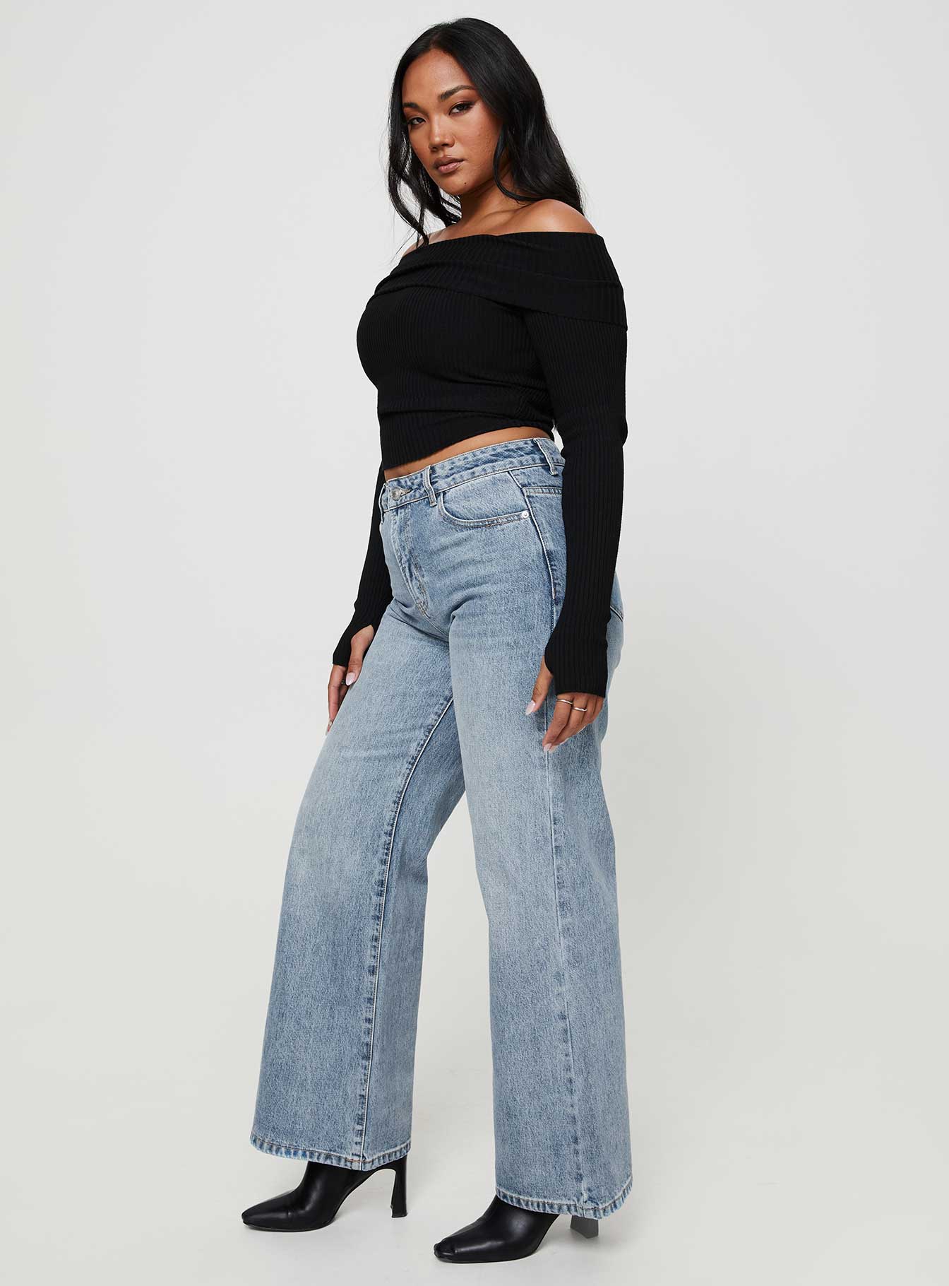 Wide leg jeans mid-wash denim Belt looped waist five pocket design zip and button fastening