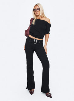 side view of model wearing Princess Polly Kortnee Eyelet Detail Flare Leg Pants Black Low Rise Pants 