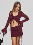 Matching two-piece set Long sleeve style, v-neckline, frill detail, tie fastening, split hem Mini skirt, frill detail, invisible zip fastening Non-stretch material, fully lined  Princess Polly Lower Impact 