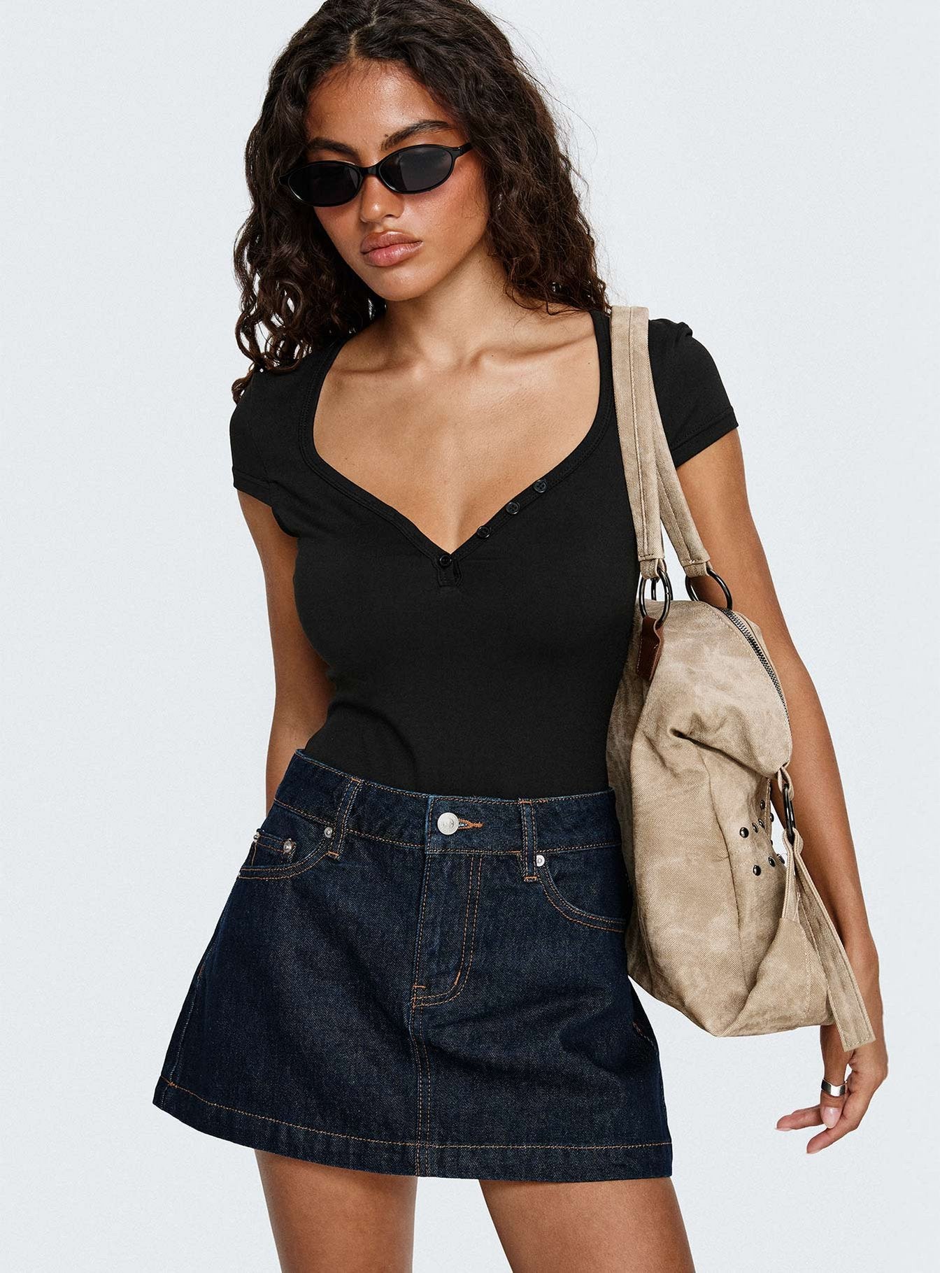 front view of model wearing Princess Polly Laretta Button Up Bodysuit Black Short Sleeve 